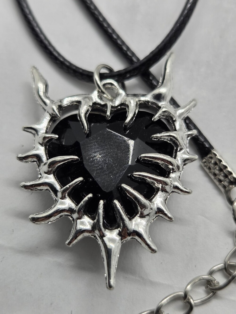 Silver Tone Spike Heart Pendant Necklace with Black Cord